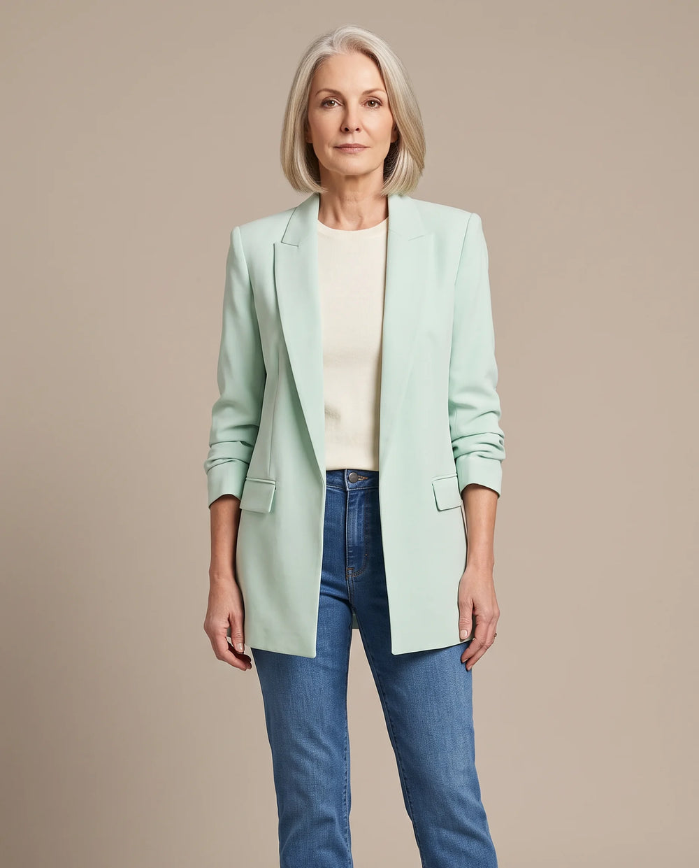 Delphine oversized open-front blazer in mint, shown open over an ivory top with blue jeans