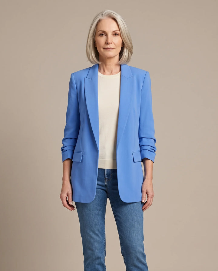 Delphine oversized open-front blazer in blue, shown open over an ivory top with blue jeans