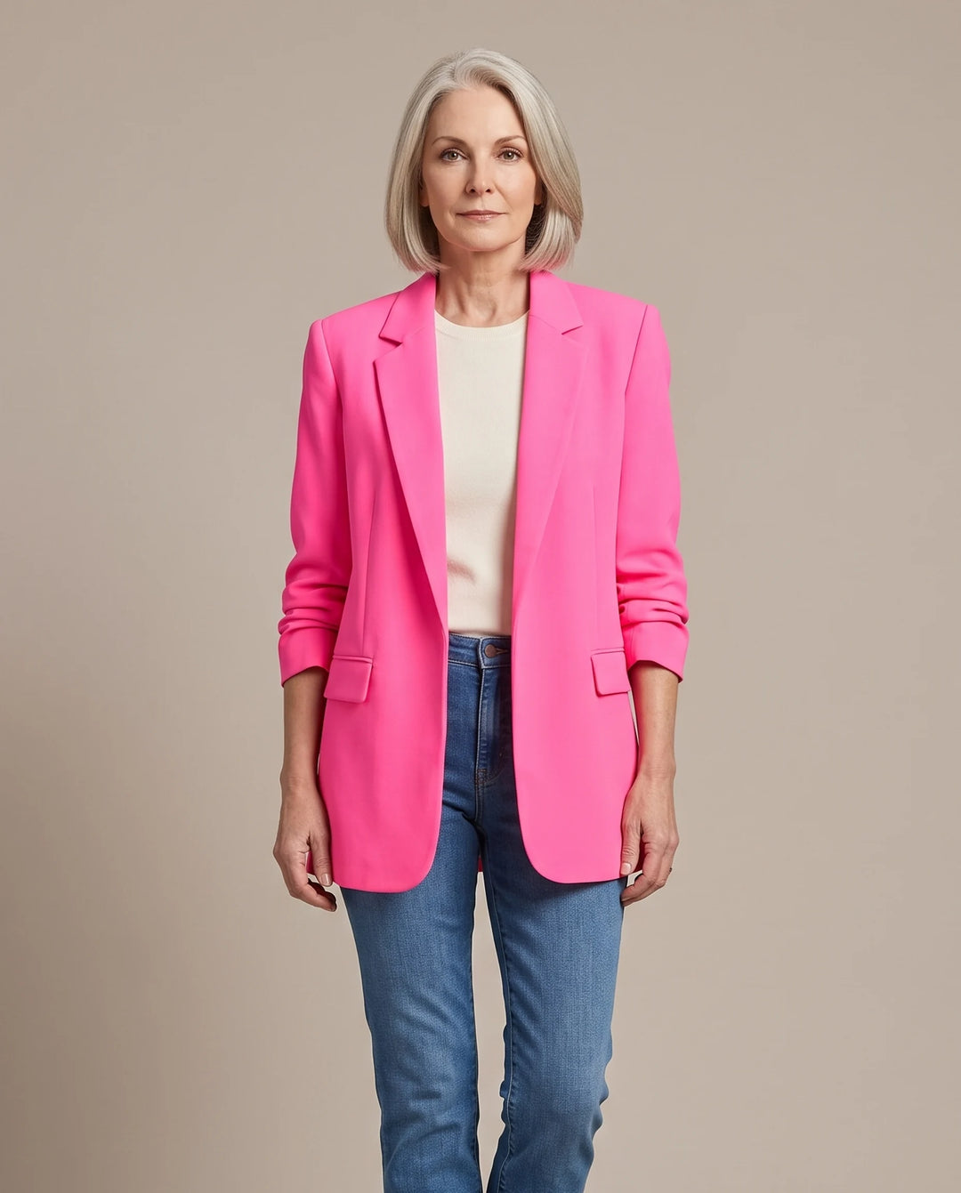 Delphine oversized open-front blazer in bright pink, shown open over an ivory top with blue jeans